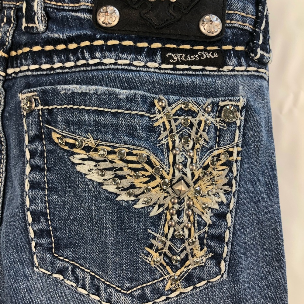 Miss Me  sz 28 boot cut jeans with wings on pocket